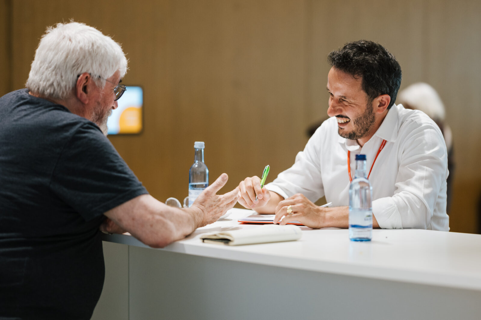 Sebastien Philippe discussing with Rae McGrath (1997 Nobel Peace Prize) at the 2026 Lindau Nobel Laureates meeting.