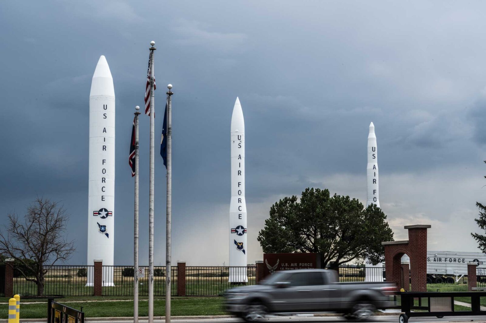 Three generations of minuteman missiles in front of Warren Air Force Base.